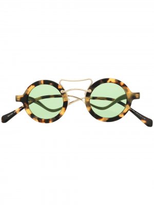 Солнцезащитные очки в круглой оправе черепаховой расцветки Miu Eyewear. Цвет: коричневый