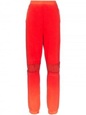 Спортивные брюки в технике пэчворк AMBUSH. Цвет: оранжевый