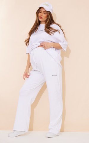 Белые широкие брюки в рубчик с рисунком для беременных PrettyLittleThing