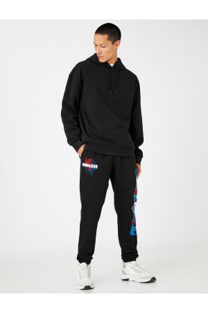 Базовые спортивные штаны Jogger с кружевом на талии и карманами принтом , черный Koton