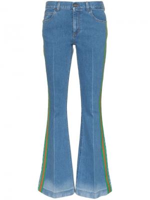 Расклешенные джинсы с боковыми полосками Gucci. Цвет: синий