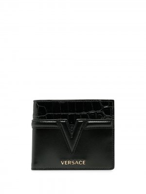 Кошелек с тисненым логотипом Versace. Цвет: черный