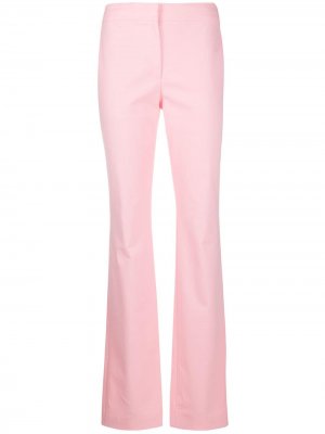 Расклешенные брюки средней посадки Moschino. Цвет: розовый