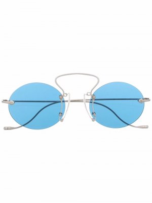 Солнцезащитные очки в круглой оправе Uma Wang. Цвет: серебристый