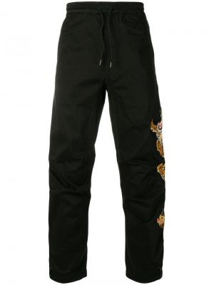 Спортивные брюки с принтом тигра Maharishi. Цвет: черный