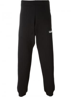 Спортивные брюки с принтом-логотипом Carhartt. Цвет: чёрный