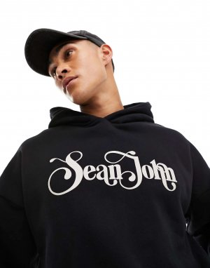 Черный пуловер в стиле ретро с логотипом Sean John. Цвет: черный