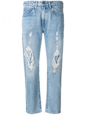 Укороченные джинсы с рваными деталями Levi's: Made & Crafted. Цвет: синий