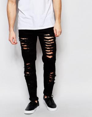 Рваные зауженные джинсы Other UK. Цвет: черный