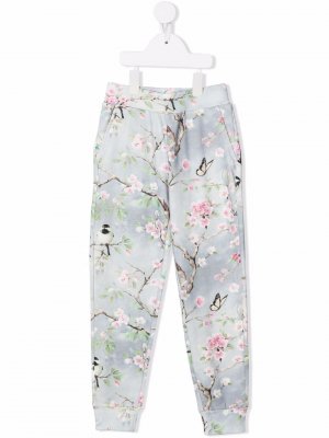 Спортивные брюки с цветочным принтом Monnalisa. Цвет: синий