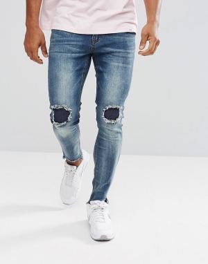 Выбеленные джинсы скинни с рваной отделкой boohooMAN. Цвет: синий