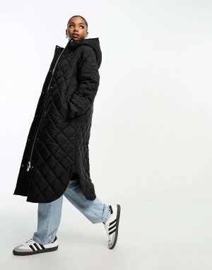 Черное длинное стеганое пальто с капюшоном Monki. Цвет: черный