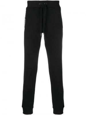Спортивные брюки с логотипом Versace Jeans. Цвет: черный