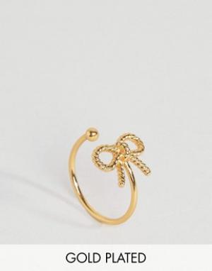 Кольцо с бантиком в винтажном стиле Olivia Burton. Цвет: золотой
