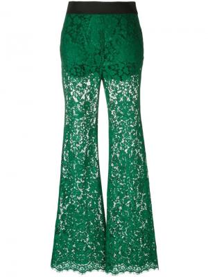 Расклешенные кружевные брюки Dolce & Gabbana. Цвет: зелёный