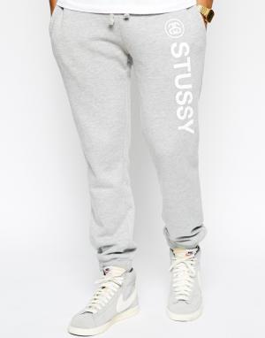 Спортивные штаны с логотипом Stussy. Цвет: серый