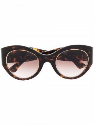 Солнцезащитные очки в круглой оправе Cartier Eyewear. Цвет: коричневый