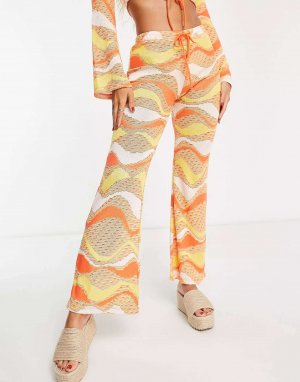Оранжевые вязаные брюки с расклешенной передней частью Festival New Girl Order. Цвет: оранжевый