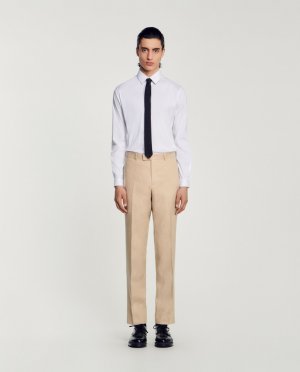Узкие мужские бежевые классические брюки , бежевый Sandro. Цвет: бежевый