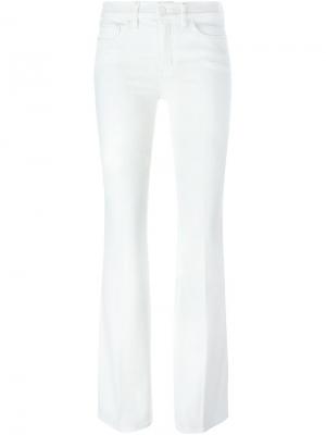 Расклешенные джинсы Tory Burch. Цвет: белый