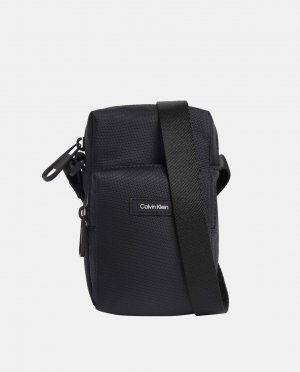Миниатюрная черная сумка через плечо из переработанного материала на молнии , черный Calvin Klein