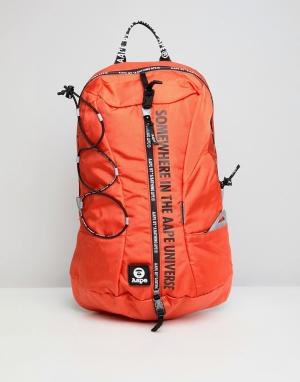 Оранжевый рюкзак AAPE BY A BATHING APE. Цвет: оранжевый