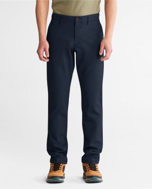 Узкие мужские брюки чинос темно-синего цвета , темно-синий Timberland. Цвет: синий