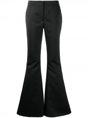 Расклешенные брюки Moschino. Цвет: черный