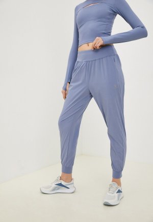 Брюки спортивные Kelme Женские тканые. Цвет: фиолетовый