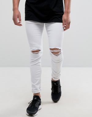 Белые джинсы скинни с рваной отделкой River Island. Цвет: белый