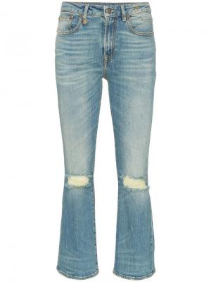 Расклешенные джинсы с прорванными деталями на коленях R13