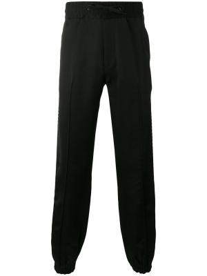 Спортивные брюки с полосатой окантовкой Marc Jacobs. Цвет: чёрный
