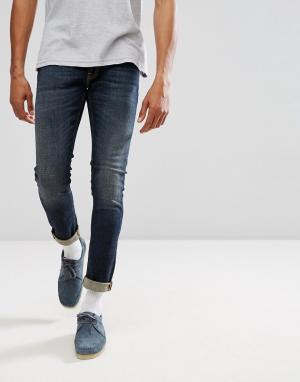 Синие зауженные джинсы Co Lin Nudie Jeans. Цвет: синий