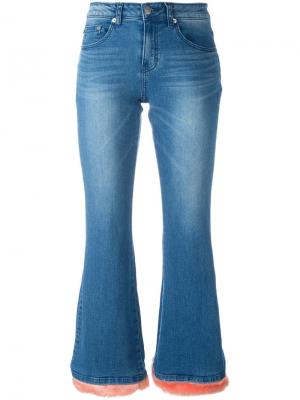 Расклешенные джинсы с ворсистым подолом Steve J & Yoni P. Цвет: синий