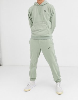 Флисовые джоггеры цвета хаки с полосками по бокам и ремнем пряжкой-клипсой -Зеленый Nike SB