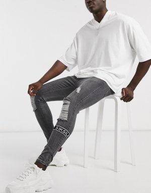 Черные выбеленные зауженные джинсы с рваными коленями и логотипом -Черный SikSilk