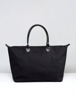 Черная парусиновая дорожная сумка Mi-Pac. Цвет: черный