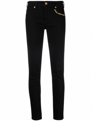 Узкие джинсы с вышитым логотипом Versace Jeans Couture. Цвет: черный