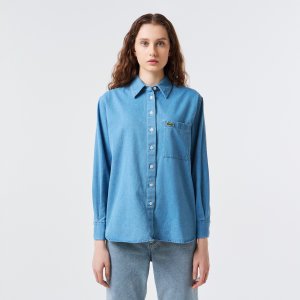 Блузы и рубашки Женская джинсовая рубашка Oversized Lacoste. Цвет: голубой