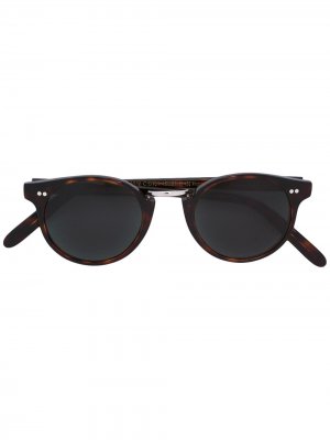 Солнцезащитные очки в круглой оправе Cutler & Gross. Цвет: коричневый